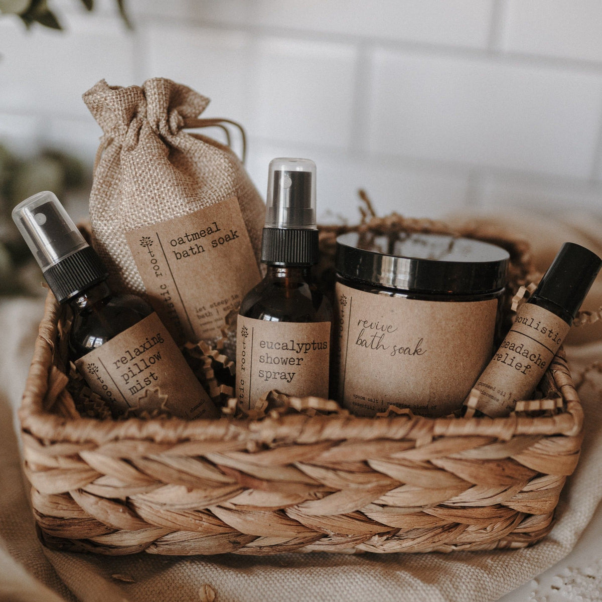 Soulistic Root Spa Gift Set products in a woven basket